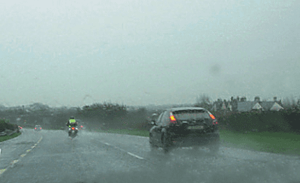 Driving theory illustration: How does rain affect driving in this situation