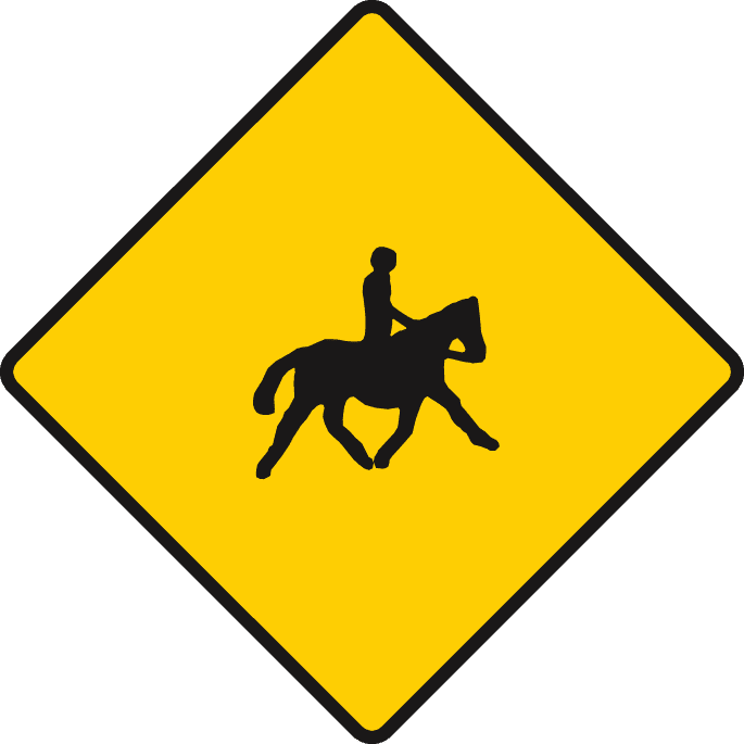 Road sign: Accompanied horses and ponies ahead