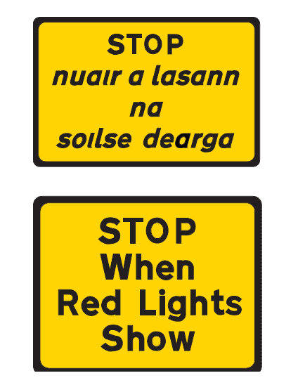 Road sign: The driver must stop when red lights show