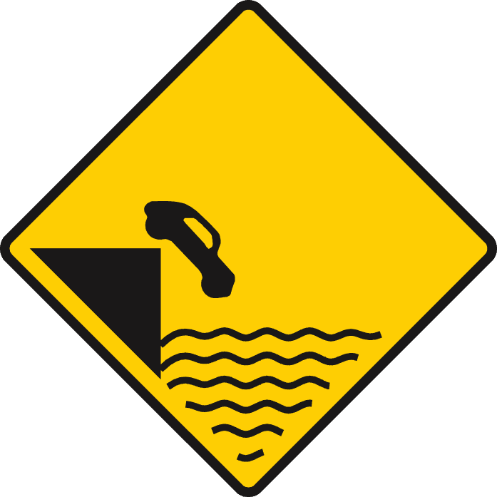 Road sign: Unprotected quay; canal or river ahead
